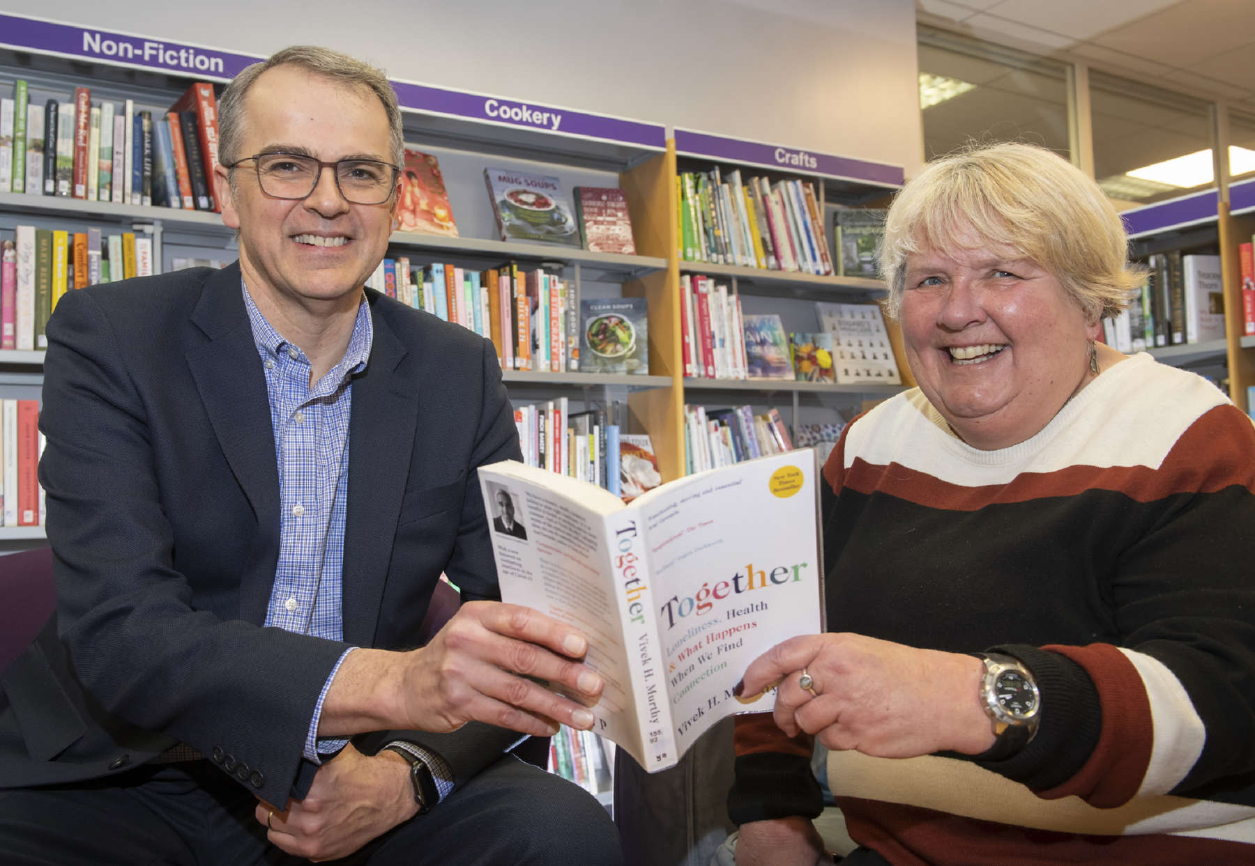 Andrew Haigh and Chrys Mellor having a read in Knaresborough library