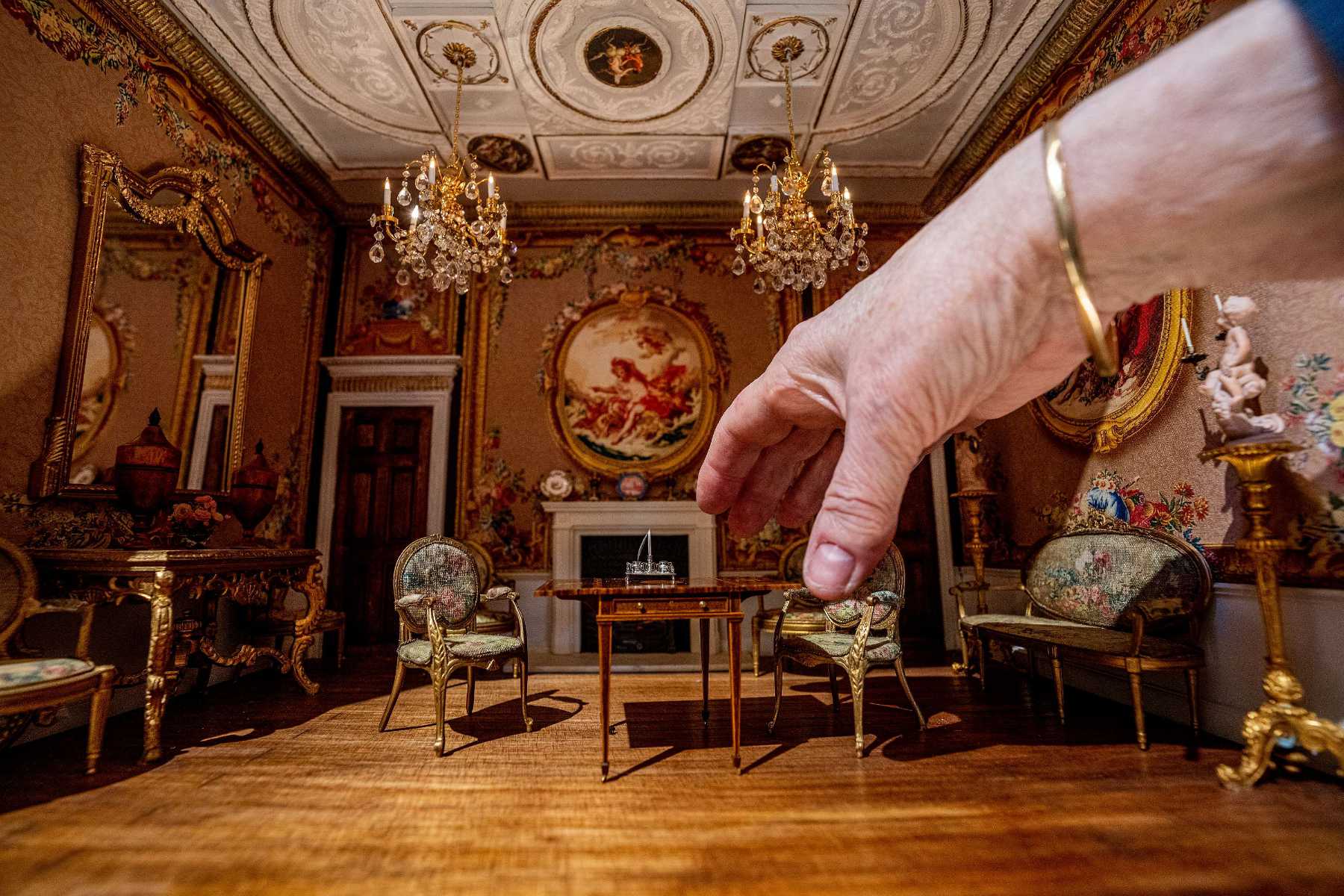 The miniature Chippendale table being installed at Newby Hall