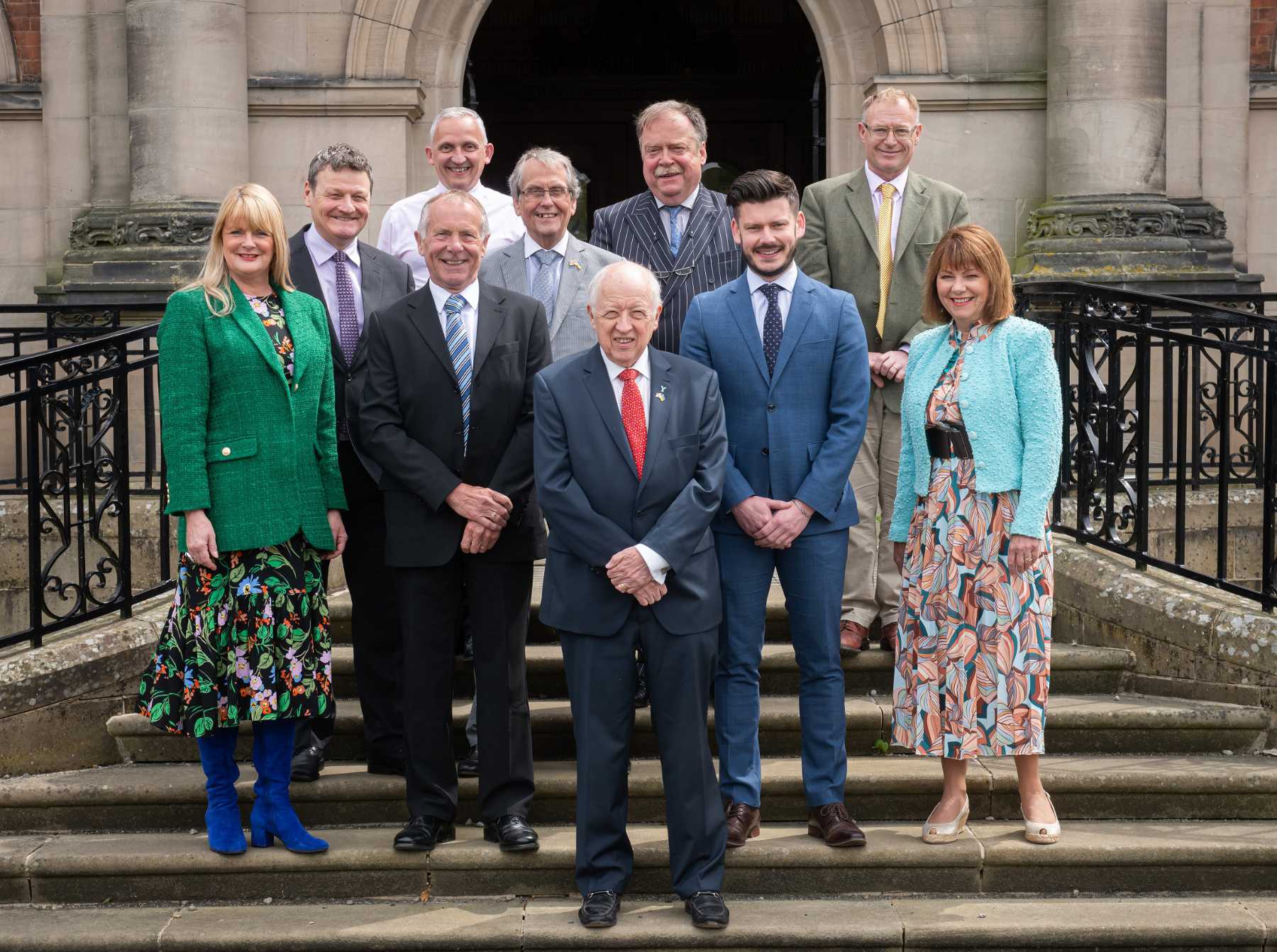 North Yorkshire County Council’s new executive on the steps of County Hall in Northallerton. Back row, from left to right, Cllr Greg White, Cllr Michael Harrison, Cllr David Chance, Cllr Simon Myers and Cllr Gareth Dadd. Front row, left to right, Cllr Annabel Wilkinson, Cllr Derek Bastiman, Cllr Carl Les, Cllr Keane Duncan and Cllr Janet Sanderson