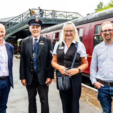 Kevin Hollinrake MP with Mike Wynn, Margaret Stainburn and Piglet, aka Paul Middleton, Traction and Rolling Stock Manager (all NYMR)