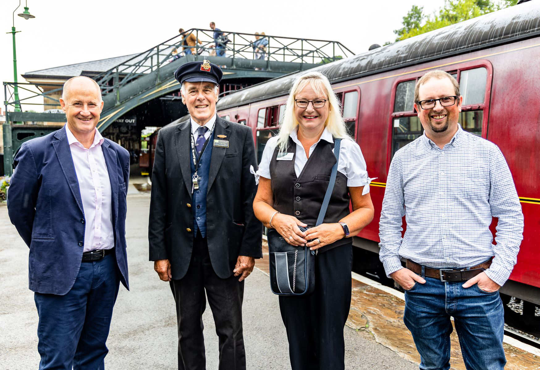 Kevin Hollinrake MP with Mike Wynn, Margaret Stainburn and Piglet, aka Paul Middleton, Traction and Rolling Stock Manager (all NYMR)