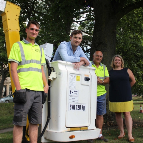 Councillor Sam Gibbs and head of parks and environmental services Alison Wilson with Yorkshire Lighting and Electrical Services