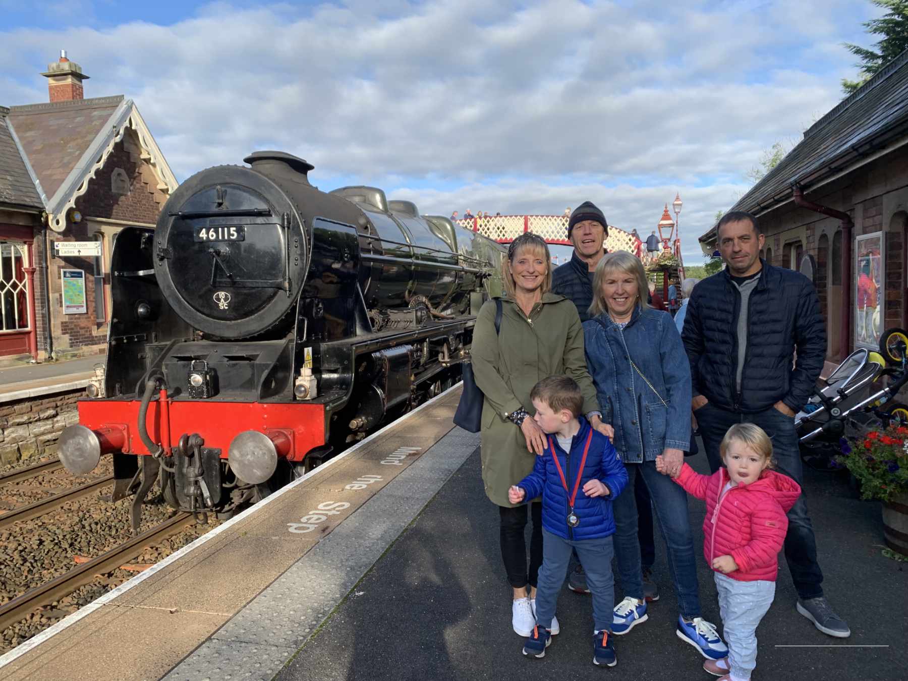 Full steam ahead for family railway experience for Andy Richardson, Colin Ousby, Julia Richardson and Janet Ousby, ready to be waved off by Rosie Cannon, 2 and brother Noah Cannon, 6 at Appleby Railway Station.