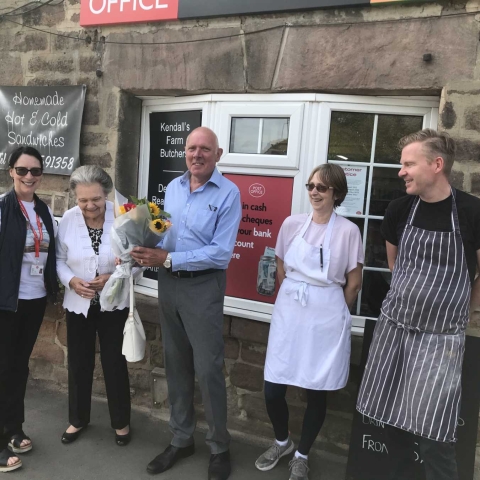Tim Dee with other staff, with local councillor Shirley Fawcett and Post Office Area Manager Dawn Pentry (left)