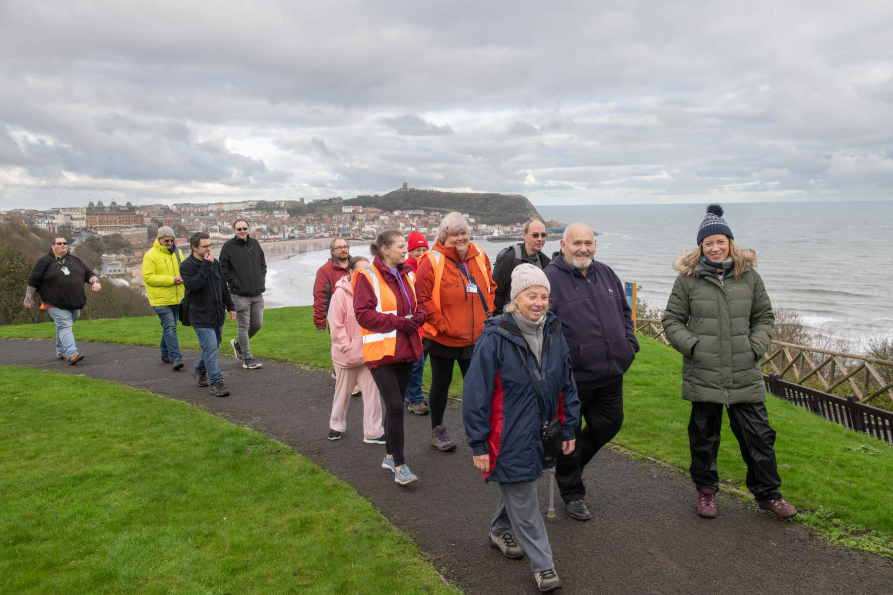 Carers Plus Yorkshire community engagement advisor Sarah Cockburn (front right) with Stuart Wilson, Paul Connor and fellow Stepping Out members on a respite walk in Scarborough