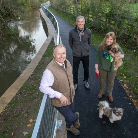 Cllr Gareth Dadd, Mayor of Thirsk, Cllr David Jackson, and resident Wendy Gibson-Brown with dogs Molly and Bodie