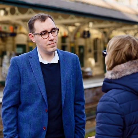 Tom Gordon talking with a Knaresborough resident at the station