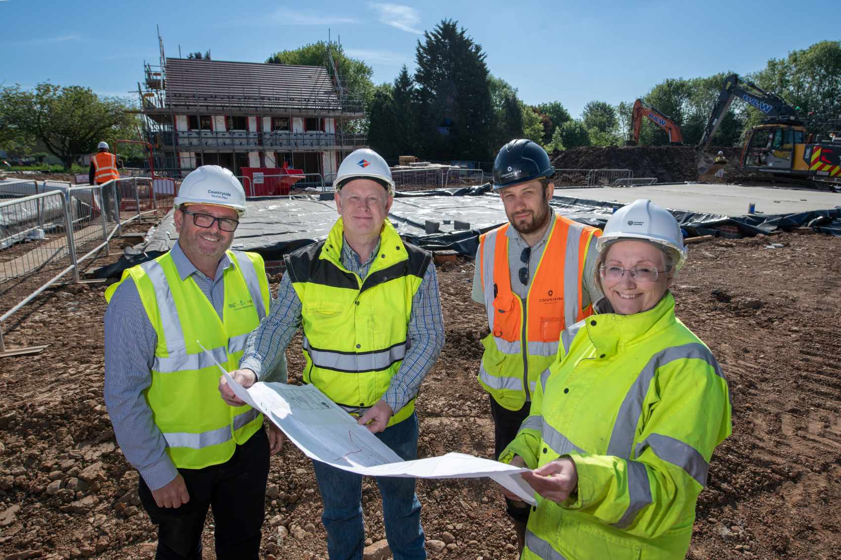 (L – R) Stuart La-Ffin of Countrywide Projects, David Blakey of Summers-Inman, Dave Bunko, Site Manager at Countryside Partnerships and Christine Uren, Development Project Assistant at Yorkshire Housing