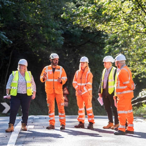 Carolyn Frank and Lee Harris-Hamer in the yellow vests with North Yorkshire Council’s highways officers viewing the maintenance works on Sutton Bank