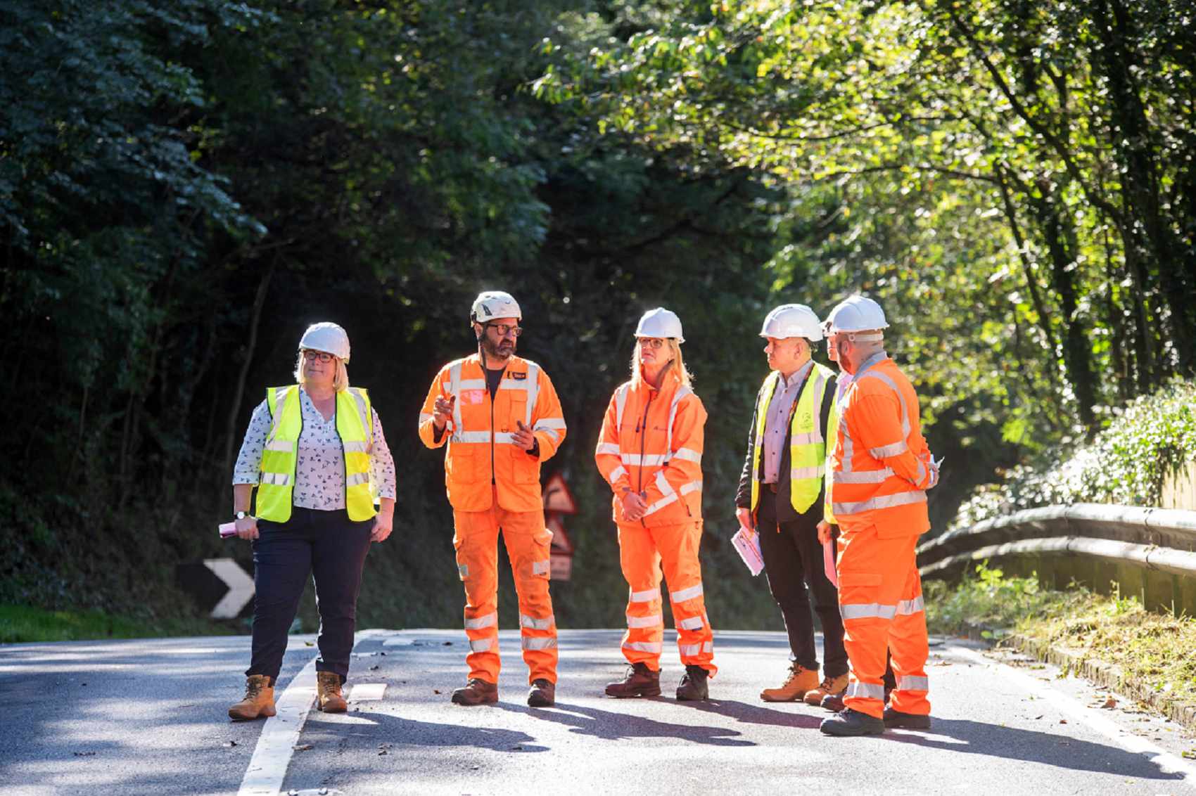 Carolyn Frank and Lee Harris-Hamer in the yellow vests with North Yorkshire Council’s highways officers viewing the maintenance works on Sutton Bank