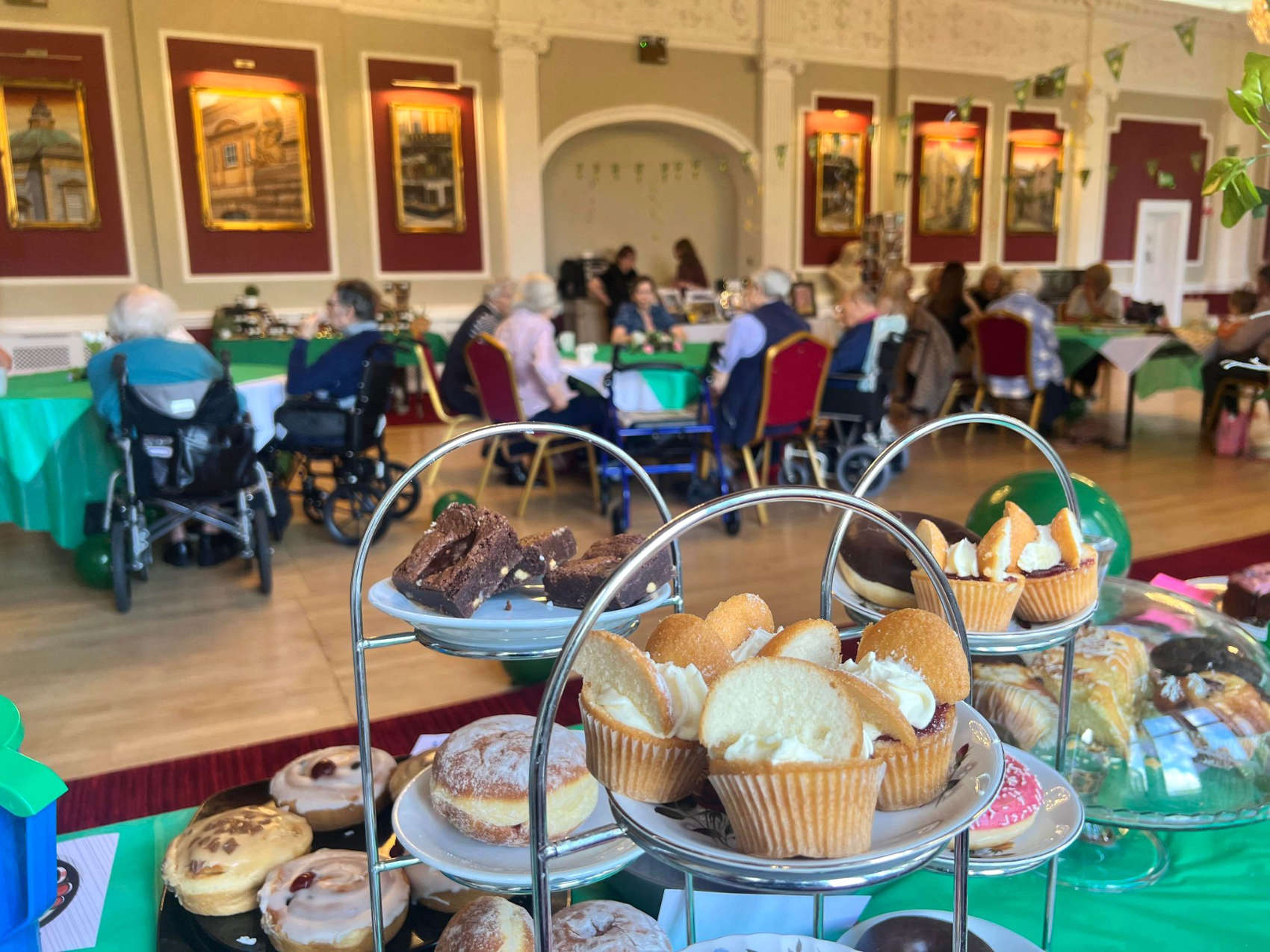 Members of the community joined residents for a cuppa and delicious cakes