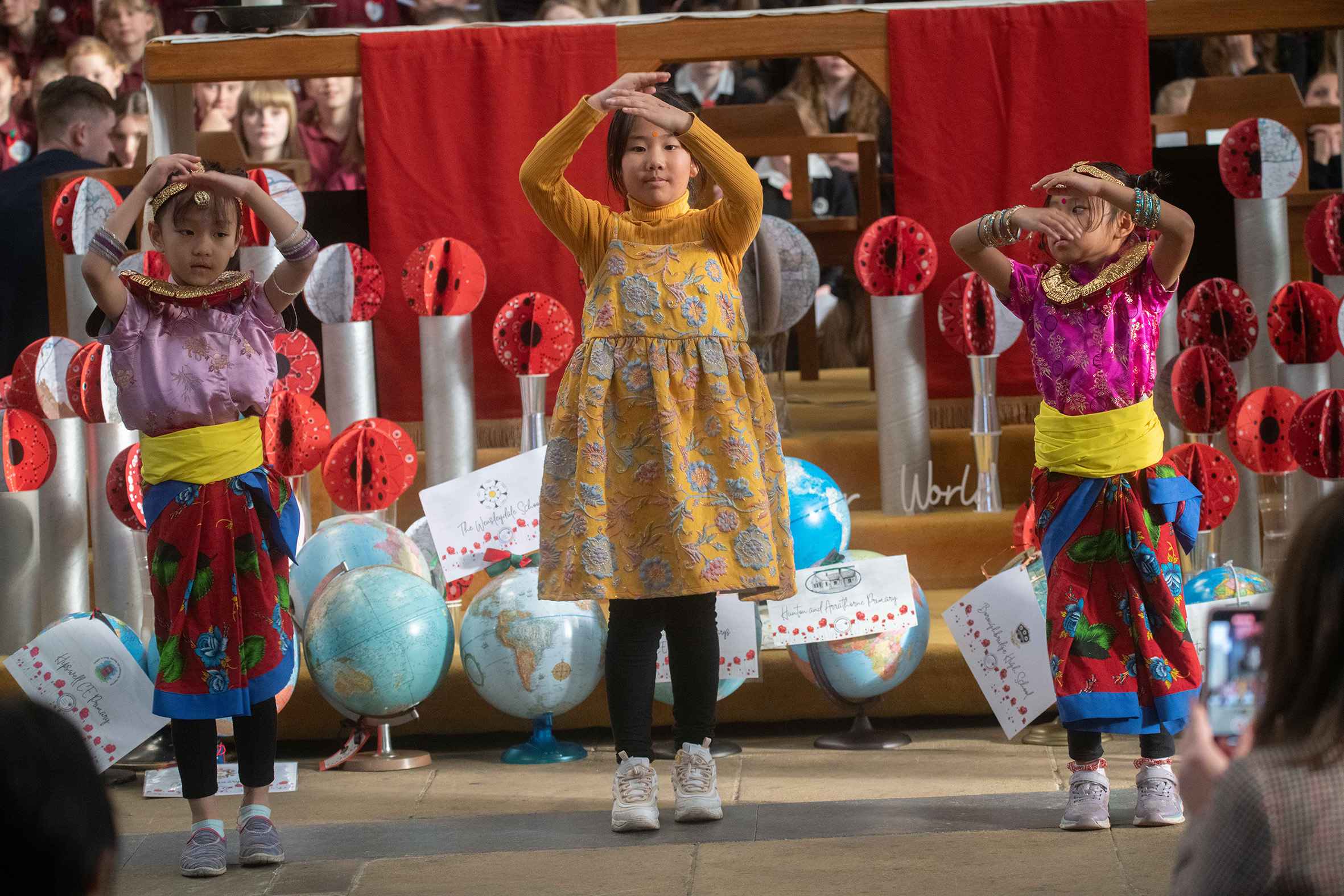 Wensleydale School students Millie Gilbey and Jessica Arnott with their school’s globe.
