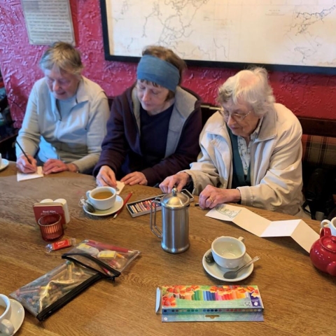 Members of Making Connections working on the art project