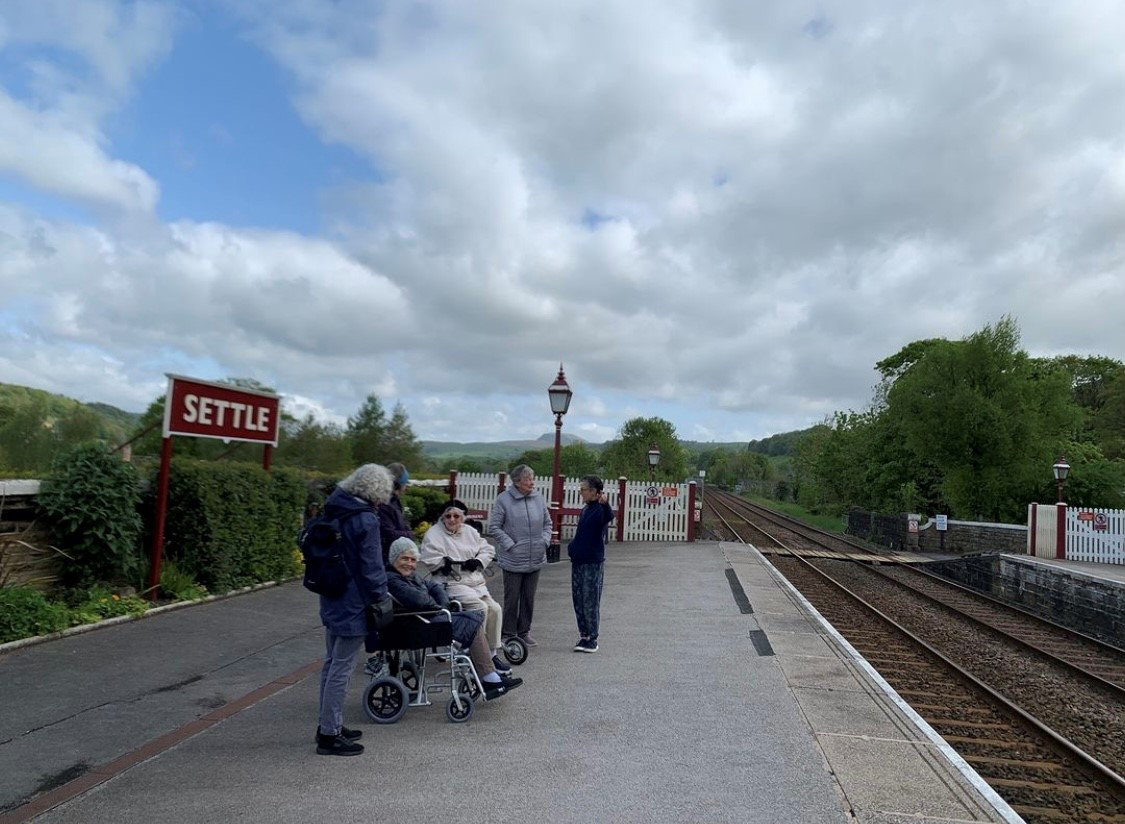 Members of Making Connections during their train journey along the Sette-Carlisle line, which inspired the Red Threads
