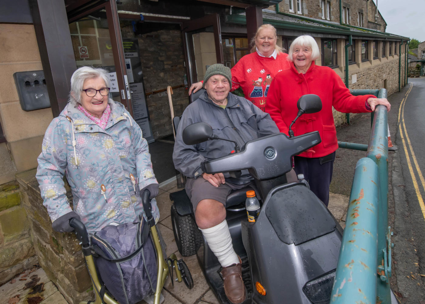 Rose Mary Baxter, Burke Smith, Hazel Drew and Jean Rowley outside the new accessible doors at Grassington Town Hall
