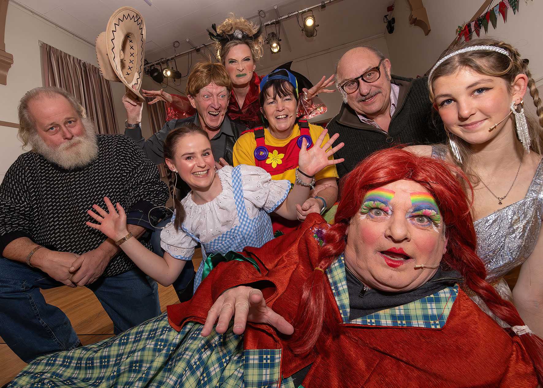 Cllr Arnold Warneken (left) and Cllr Andy Paraskos (right) with Tockwith Players in their Wizard of Wilstrop pantomime costumes and wearing their new headset mics, (from left) Sandra Adlington, Geoff Farnworth, Karen Coombes, Sue Corbett, David Hardman and Ellie Triffitt