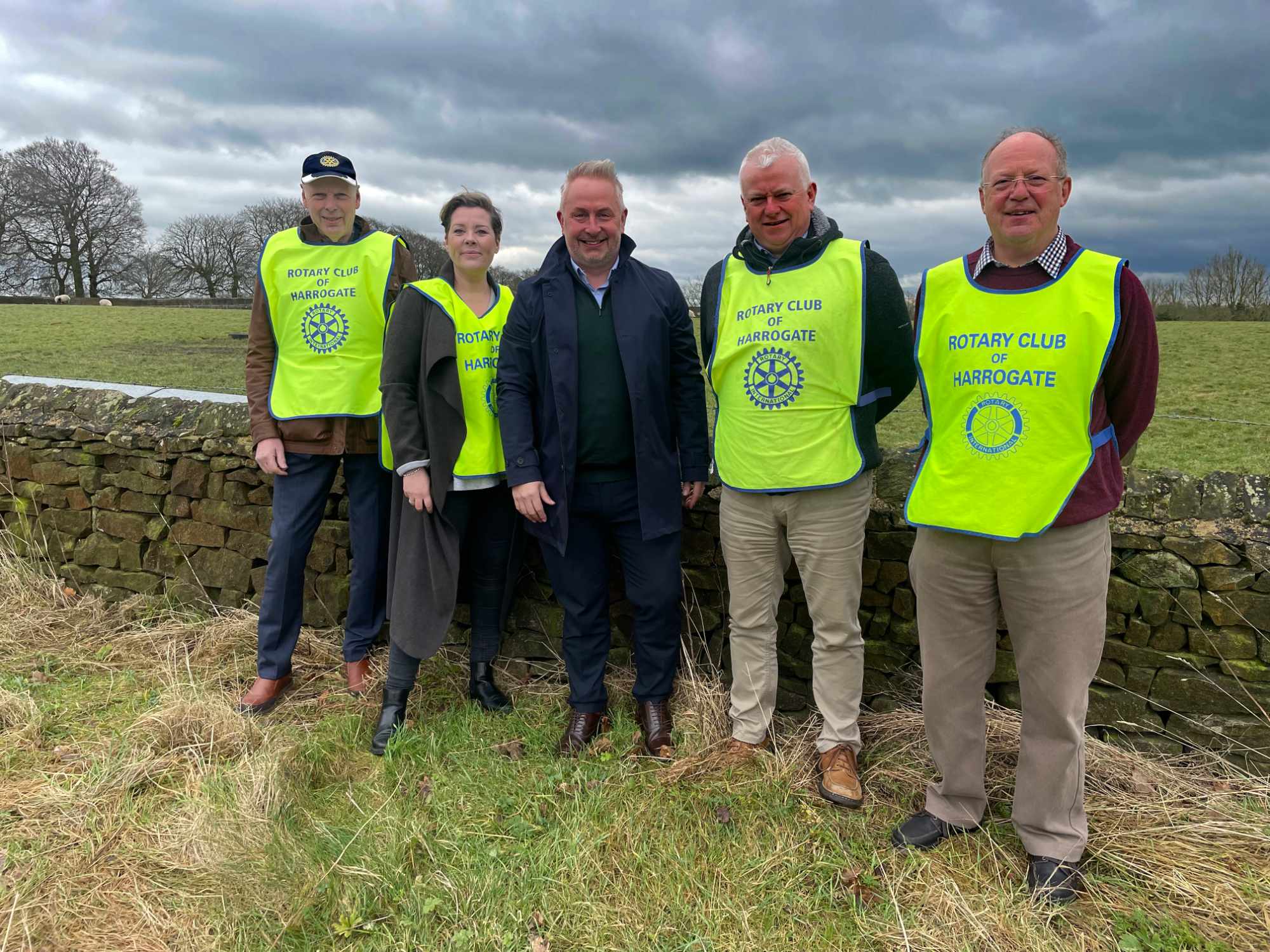 Members of the Rotary Club of Harrogate, Alistair Ratcliffe, Vic Smith-Dunn, John Wallace and Charles Dickinson with Verity Frearson Director Matthew Stamford (in the centre)