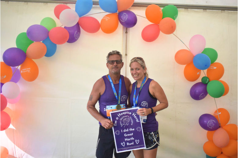 Sam Garrard with husband Phil in the Charity Village at the Great North Run