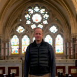 Guy Critchlow, chairman of Skelton cum Newby Parish Council inside the Church of Christ the Consoler