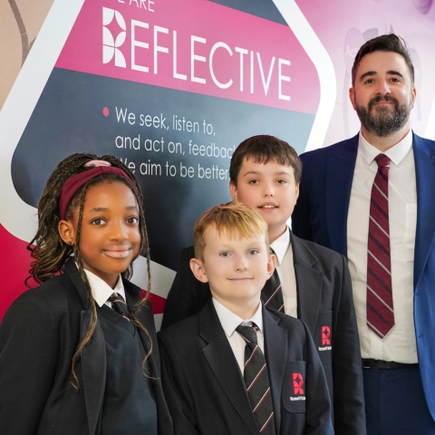 ossett - Mr Milburn with Students