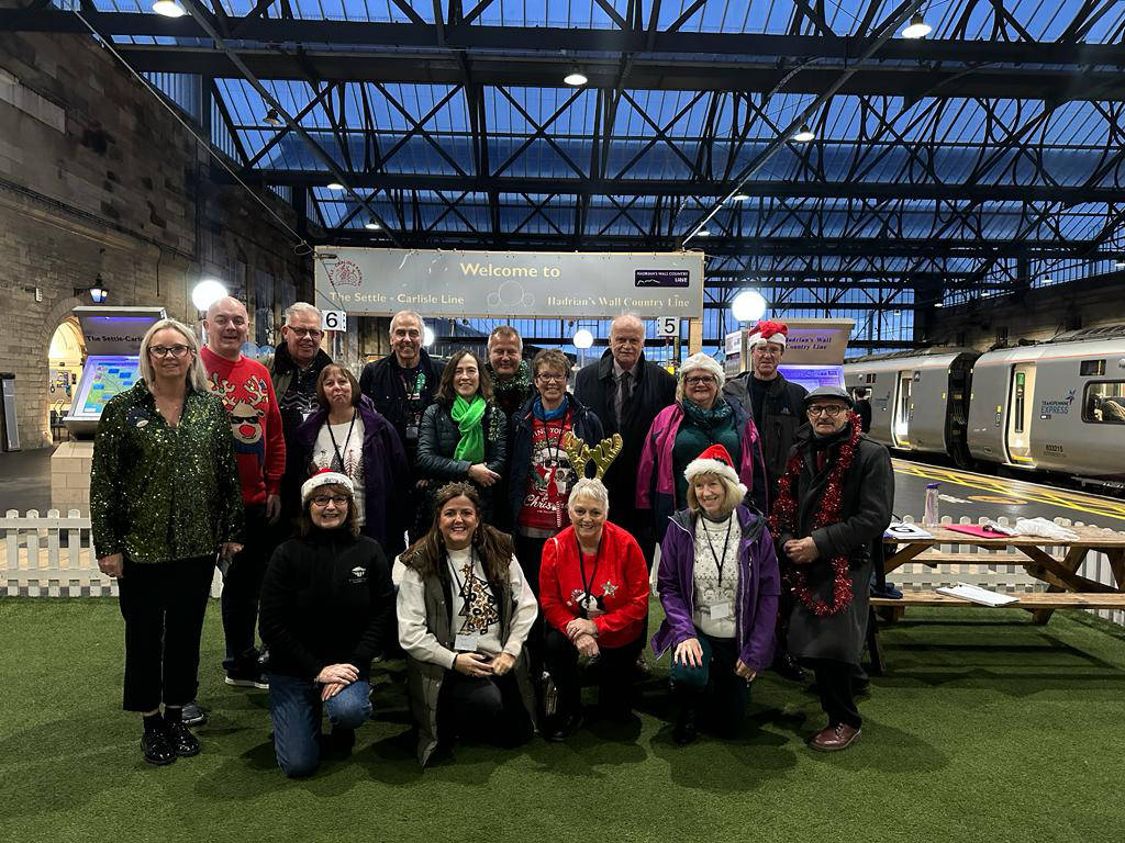 Settle Carlisle Development Company team and volunteers pictured at The Citadel railway station in Carlisle ahead of their chartered Festive Special Steam Train last year