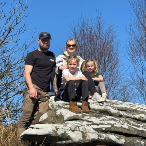 Allan and Leeanne Stewart became foster carers four years ago this month. They are pictured with their daughters Lillian and Daisy
