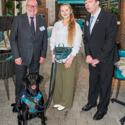 Pictured at the launch are, from left, Chairman Peter McCormick OBE, Support Dogs trainer Emily Harrison with Walter and new ambassador Jack Marshall BEM