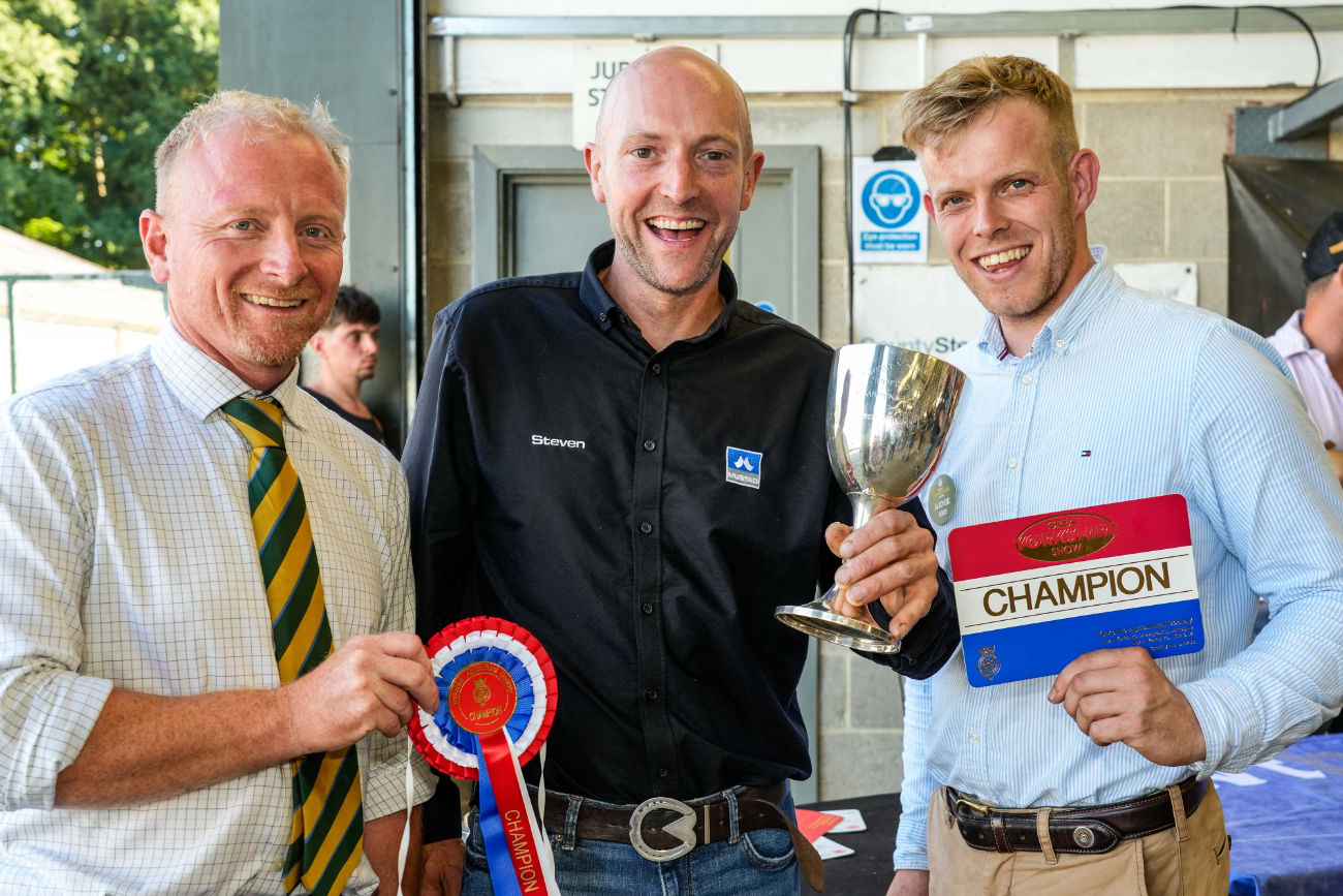 Champion Farrier Steven Beane from Yarm with judges Gavin Darby (left) and George Robertson