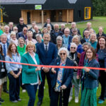 Civic dignitaries, staff and special guests, including Mrs Margaret Mosley (centre) gathered at Bewerley Park in the Nidderdale National Landscape to celebrate 60 years of outdoor learning excellence and mark the unveiling of the facility’s new 84-bed accommodation block