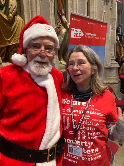 Santa (alias David Wells, Chair of Ripon Christian Aid Committee) and Elaine Gisbourne