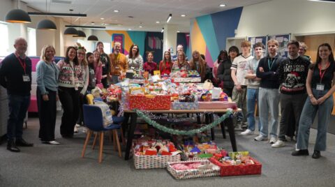 York College staff, students and representatives from The Island York with the hampers on campus