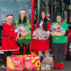 Transdev Christmas Bus – Food Donation, Transdev colleagues and The Joyful Brew volunteers pose in front of our Christmas bus