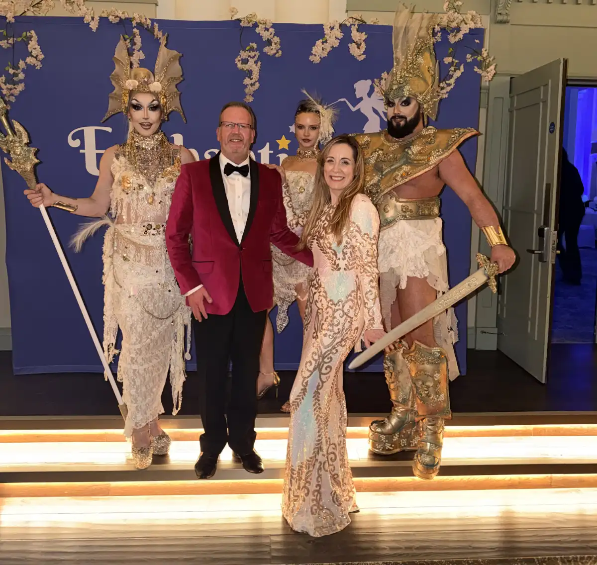 Underwater Sea drag queens with L -Simon Cotton, MC & Auctioneer (MD of Fat Badger Group) and R - Suzie Vaughan, Event Organiser and Owner/Founder of Enchanticas