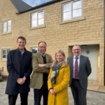 Claire Townson with Broadacres’ Director of Development and Investment Michael Jones (left) Cllr Myers and Tony Dodds (right) outside one of the Broadacres’ homes