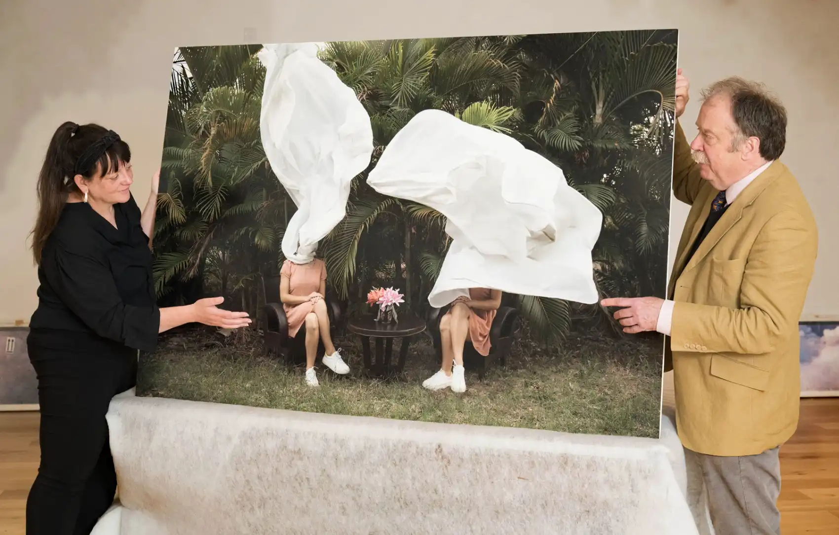 North Yorkshire Council’s executive member for arts and culture, Cllr Simon Myers listens to Aesthetica director, Cherie Federico, as she describes May Parlar’s work 'Collective Solitude' at Skipton Town Hall. The Aesthetica Art Prize exhibition will be staged at four of North Yorkshire Council’s venues from this month