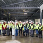 Students and staff from Harrogate College and Luminate Education Group, including Group CEO, Bill Jones (centre)