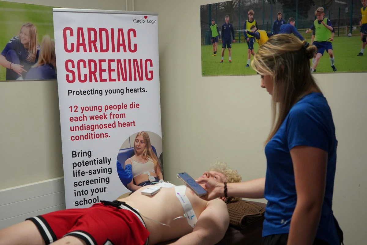 Emma Palmer carries out the simple ECG test on a student york college