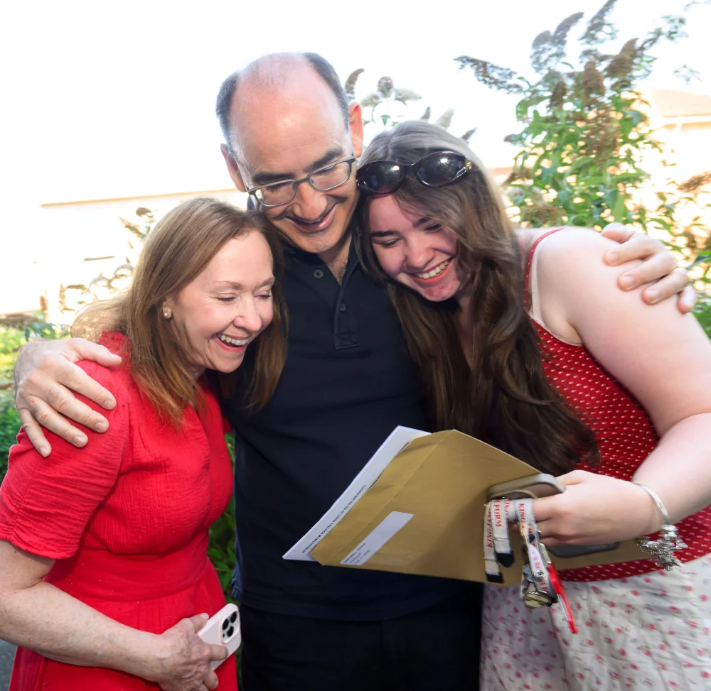 Matilda Hartwell of King James's School in Knaresborough celebrating her results with her parents